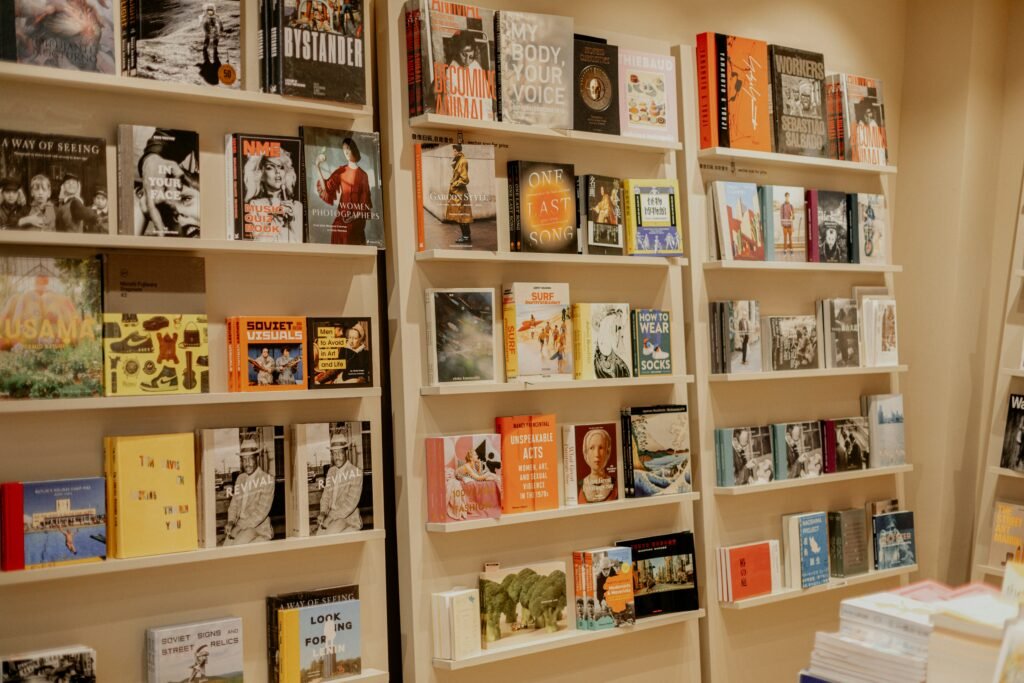 Books on library shelves representing knowledge and publishing.